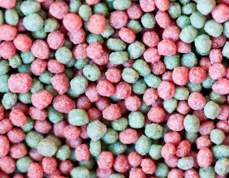 colorful pet food for tiny fishの写真素材