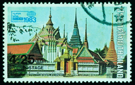 THAILAND - CIRCA 1983: a stamp printed by Thailand, shows The temple in Thailand, circa 1983の写真素材