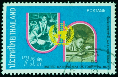 THAILAND - CIRCA 1975: a stamp printed by Thailand, shows United Nations Day, circa 1975の写真素材