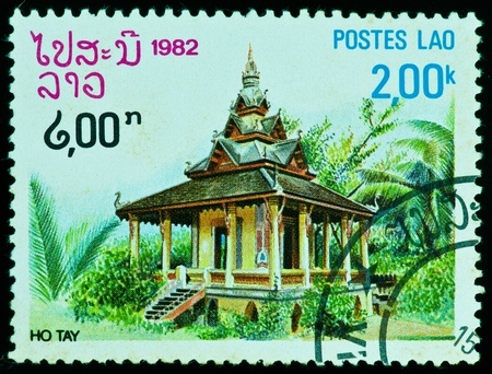 The Lao PeopleÕs Democratic Republic CIRCA 1982: a stamp printed by The Lao PeopleÕs Democratic Republic, shows The temple in Lao, circa 1982の写真素材