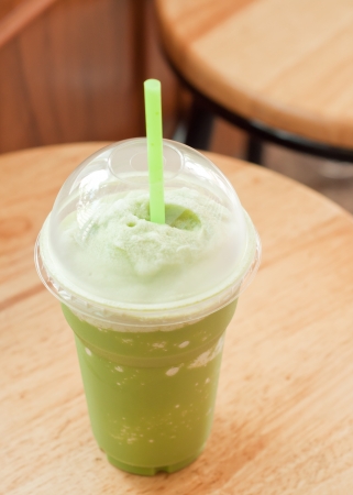 iced green tea on wood tableの写真素材