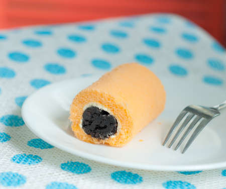 orange roll cake with chocolateの写真素材