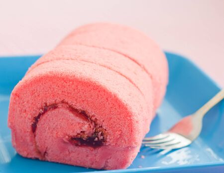 strawberry roll cake in the cafeの写真素材