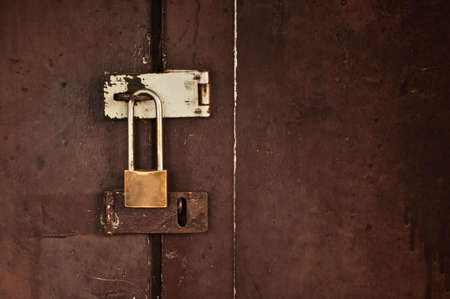 lock on a wooden door backgroundの写真素材