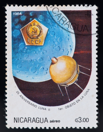 NICARAGUA - CIRCA 1984: a stamp printed by Nicaragua, shows 25 anniversary lunar 2, circa 1984のeditorial素材
