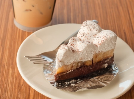 pie cake with banana and chocolate in coffee shopの写真素材