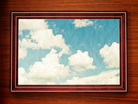 wooden window with blue sky paper