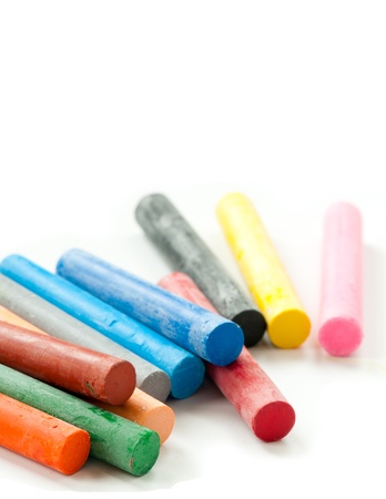 colorful oil pastels isolated on whiteの写真素材
