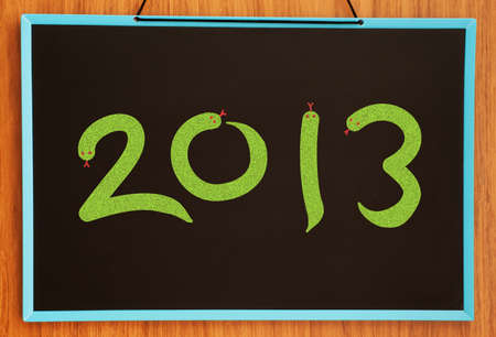 numbers 2013 on chalkboard backgroundの写真素材