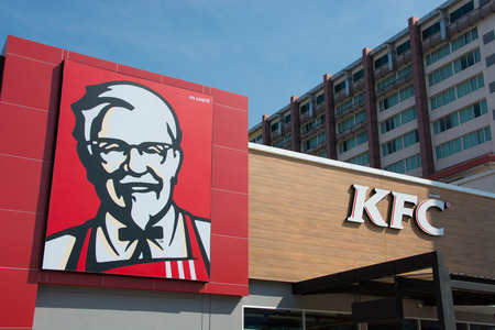 UBON RATCHATHANI, THAILAND - JANUARY 1, 2015: Kentucky Fried Chicken restaurant sign in Ubon Ratchathani, KFC is the worldのeditorial素材