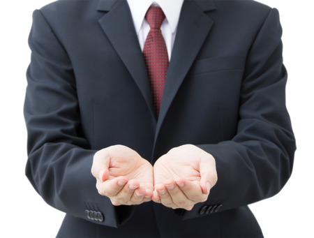 business hands as if holding someting isolated on whiteの写真素材