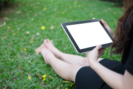 Woman using tablet computer