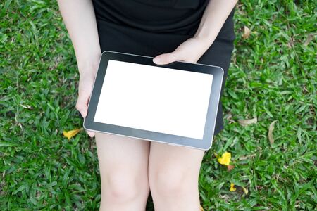 Woman using tablet computer