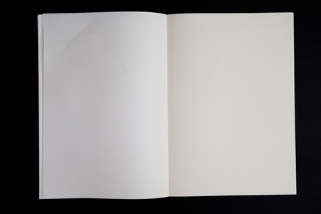 Blank page book on black backgroundの写真素材