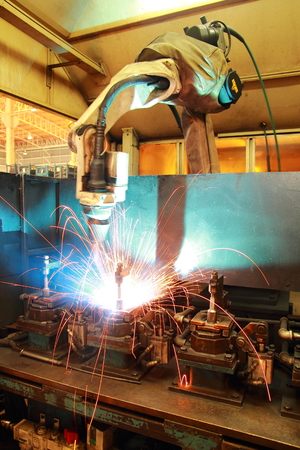 The movement of the welding robot in a car factory