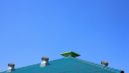 rooftop against blue skyの写真素材