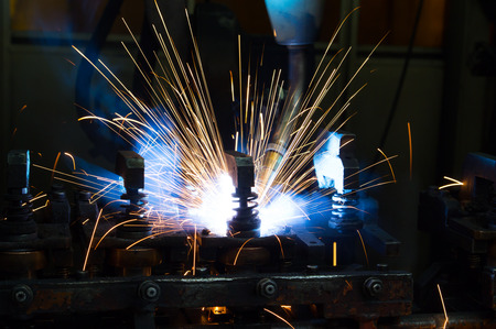 Industrial welder robotic in a car factory