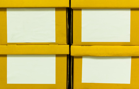 Distribution warehouse with cardboard boxes that look a mess.の写真素材