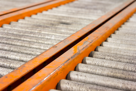 Conveyor rollers transport system for crates in factoryの写真素材