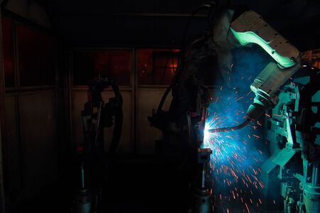 Industrial welder robotic in a car factoryの写真素材