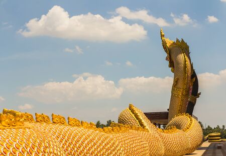 The Big scaly Naga snake guarding Thai templeの写真素材