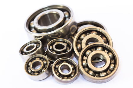 Old and dirty ball bearing, isolated on white backgroundの写真素材
