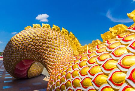 The Big scaly Naga snake guarding Thai templeの写真素材
