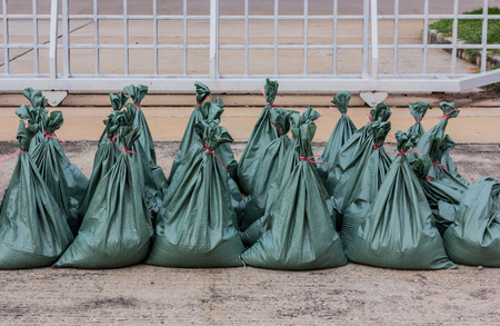 Sand bags help keep flood waters outの写真素材