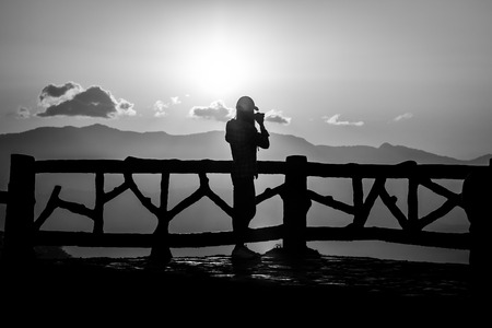 Silhouette of people having fun at sunset time