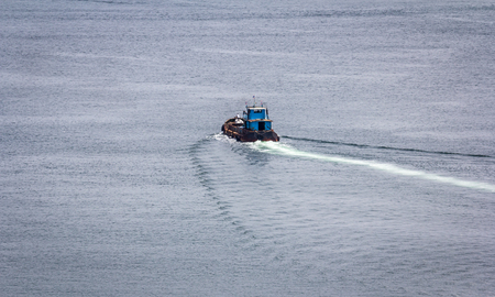 Small cruise surrounded by the sea in thailand.の写真素材