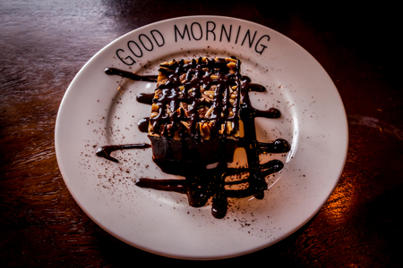 Brownie chocolate pie baked, square piecesの写真素材