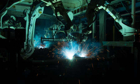Welding robots movement in a car factory. High quality photo
