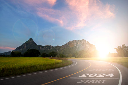 2024 New Year 2024 or the beginning of the concept, the word 2024 is written on the road in the...