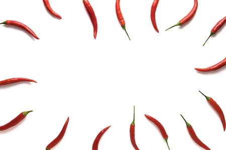 Red hot little chili peppers pattern with copyspace isolated on white background. Top view. Flat...