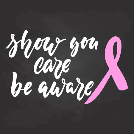 Show you care be aware - hand drawn October Breast Cancer Awareness Month lettering phrase on black chalkboard background. Brush ink vector quote for banners, greeting card, poster designのイラスト素材