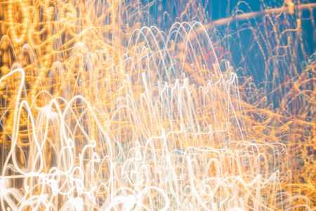 Abstract bright blurred neon trend background, multi-colored lines. Speed light beam night traffic and lights.の写真素材