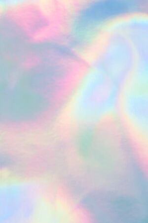 Abstract holographic purple pink background. Liquid neon rainbow foil in unicorn style. Marble iridescent futuristic texture. Trend style 90sの写真素材