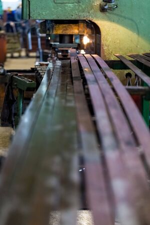 Manufacture of parts for engineering plant by stamping. Of steel strip made parts.の写真素材