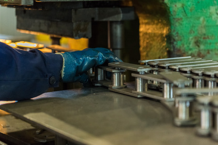 The Assembly of chains. Machine-building plant. The Assembly process of the product.