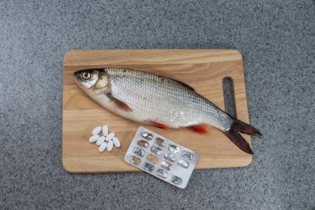 Fish and pills. The risk of food poisoning, infection with worms. Or preparation of medicines from...
