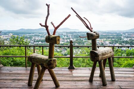 Unique wooden deer were on the balcony,Thailand.の写真素材