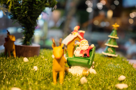 Christmas scene with deer and santaの写真素材