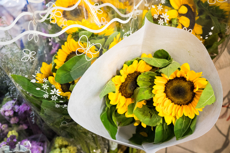Beautiful sunflower bouquet in flower marketの写真素材