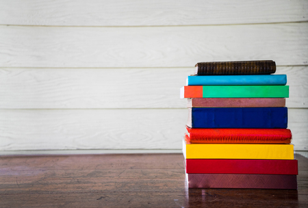 Old books on the wooden tableの写真素材
