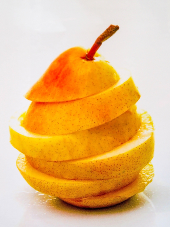 Chinese pears sliced on white backgroundの写真素材