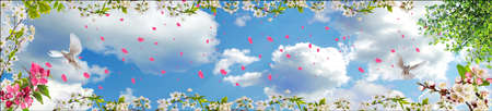 leaves flying from spring branches and dovesの写真素材