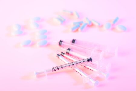 medical syringes and drug on light color toneの写真素材
