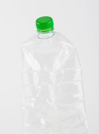 Recyclable garbage of plastic bottles on white backgroundの写真素材