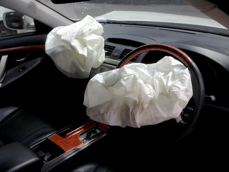 Car of accident deflated airbags after the eruption inflation due to a car collision, Airbag workの写真素材