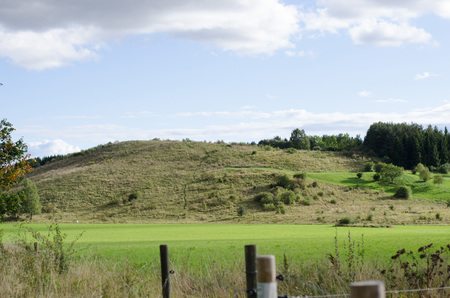 Stockholm, Sweden - September 16 2017. A view of Granholmstoppen in the northwest Stockholm during autumn. At the moment a discgolf course is located nearby but there is plans to make a multi-religion cemetary at the site.のeditorial素材